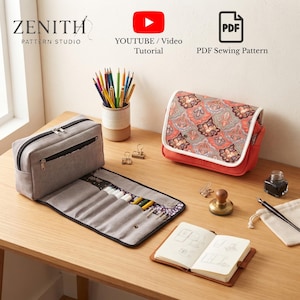 May include: A grey fabric pencil case with an open roll-out section containing pens, a red bag with a patterned flap, a pencil cup with coloured pencils, a small open notebook, a metal stamp, and a black ink bottle. Text reads Zenith Pattern Studio.