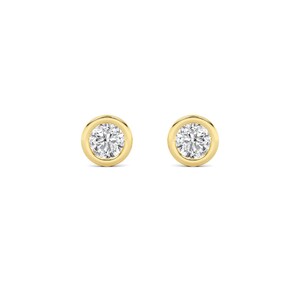 May include: A pair of gold stud earrings, each featuring a round, clear gemstone set in a bezel. The earrings are displayed against a white background, highlighting their simple elegance.