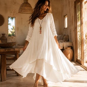 Vestido largo de algodón y lino con bolsillos y bajo asimétrico con capas para mujer.