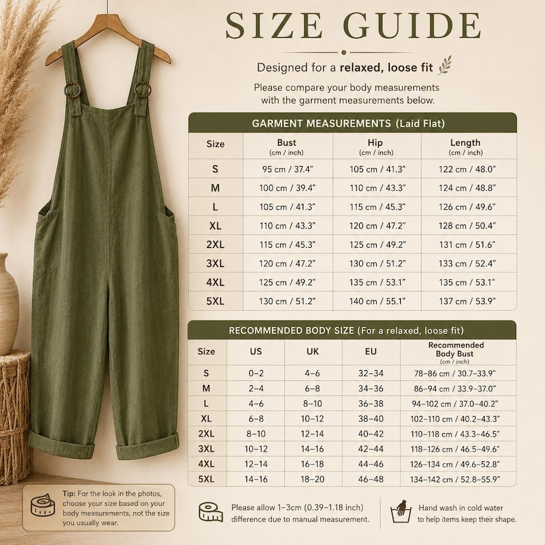 May include: An olive green jumpsuit with wide legs and shoulder straps hanging on a wooden hanger, accompanied by a size guide chart displaying measurements in centimeters and inches for sizes S through 5XL, including bust, hip, and length details.