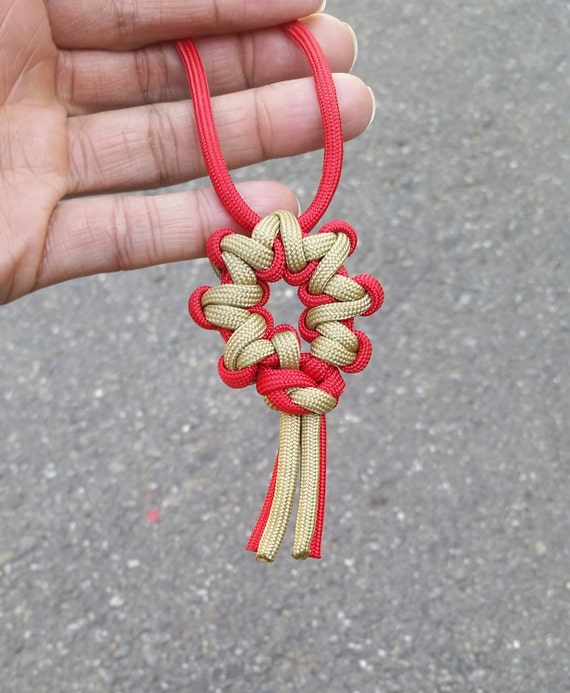 Items similar to Paracord necklace, Desert flower medallion, unique