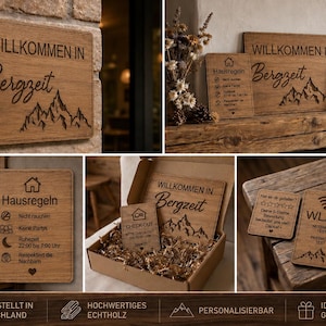 May include: Wooden signs with engraved text and mountain designs. One sign reads "WILLKOMMEN IN Bergzeit" with a mountain silhouette. Other signs include "Hausregeln" and "CHECKOUT". The signs are made of wood and have a rustic aesthetic.