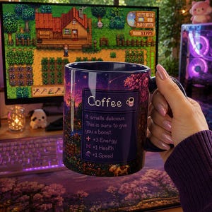 May include: A dark blue coffee mug with a starry night design and the word "Coffee" in a pixelated font. The mug has text that reads "It smells delicious. This is sure to give you a boost. +3 Energy, +1 Health, +1 Speed."