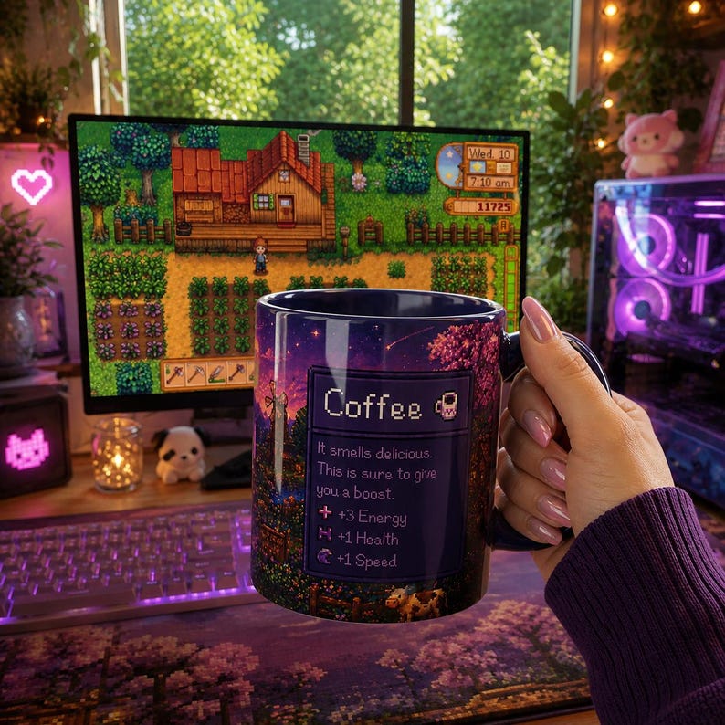 May include: A dark blue coffee mug with a starry night design and the word "Coffee" in a pixelated font. The mug has text that reads "It smells delicious. This is sure to give you a boost. +3 Energy, +1 Health, +1 Speed."