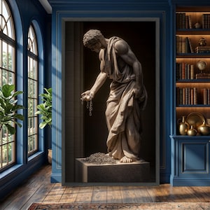 May include: A framed sculpture of a classical male figure, draped in cloth, holding a chain. The statue is a light beige color and stands on a stone pedestal. The background is dark, with a glimpse of a room with blue walls and a bookshelf.