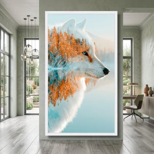 May include: A vertical rectangular wall art print featuring a double exposure effect of a white wolf profile merged with a dense forest of orange and teal trees. The wolf has a bright blue eye and is set against a soft, light blue background.