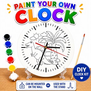 May include: A DIY clock kit with the text "PAINT YOUR OWN CLOCK". The white clock face features a dinosaur and palm trees, ready to be painted. Includes paint pots, a paintbrush, and a stand. The clock can be mounted on the wall or used with the stand.