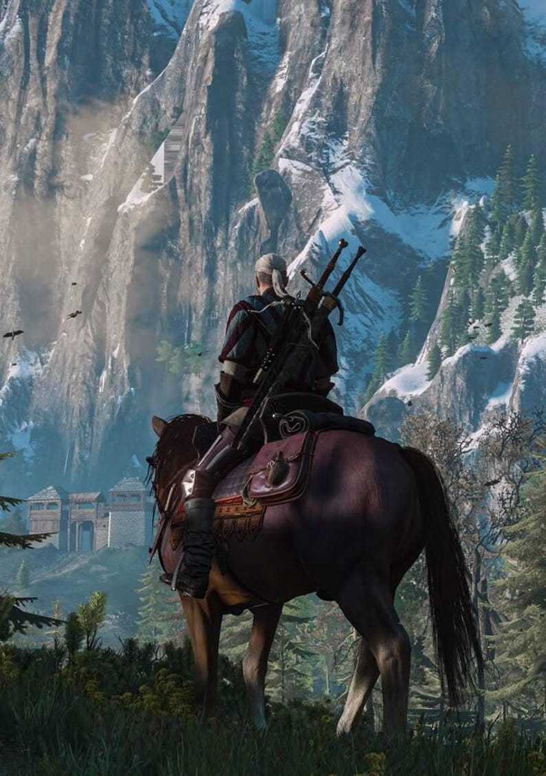 May include: A figure with white hair tied back, wearing dark armor and carrying two swords on their back, sits atop a brown horse. The horse is equipped with a leather saddle and gear, facing toward a large, snow-capped mountain range and a stone fortress.