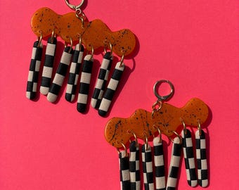 Hindsight - Amber Splatter with Checkerboard Dangles