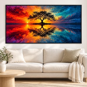 May include: A rectangular wall art print featuring a silhouette of a large tree centered on a small island. The sky displays a vibrant sunset gradient transitioning from deep red and orange to bright yellow and blue, reflected in the calm water.