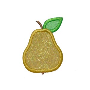 May include: A gold glitter pear with a green leaf. The pear is outlined in yellow thread.