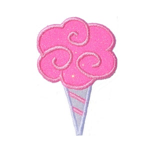 May include: Pink cotton candy with a white and pink striped cone.