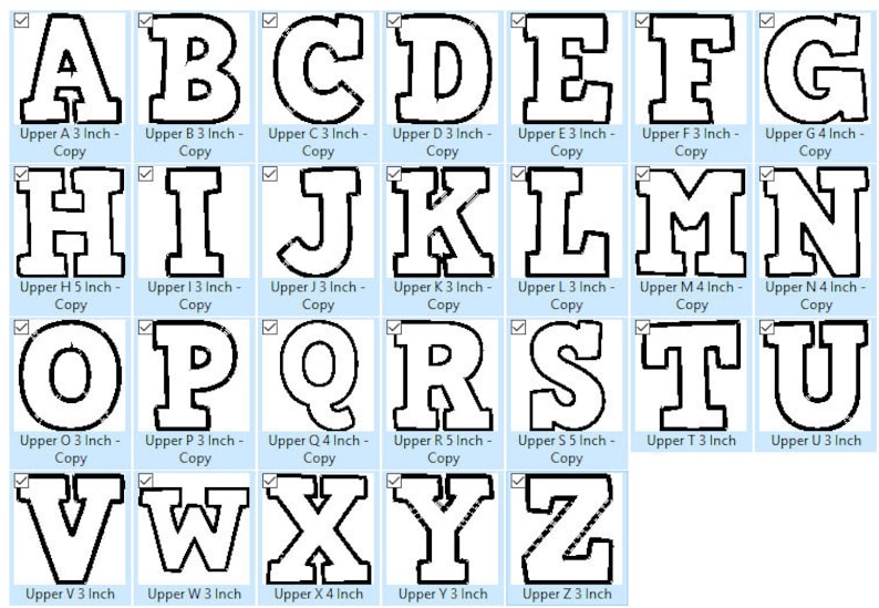 May include: A set of uppercase letters from A to Z, each with a white interior and a thick black outline. Each letter is labeled with its size in inches, ranging from 7.6 to 12.7 cm.
