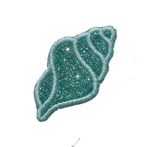 May include: A teal blue glitter seashell applique. The seashell is a detailed embroidery with a sparkly finish.