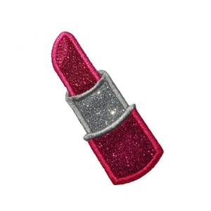 May include: A pink and silver glitter lipstick patch.