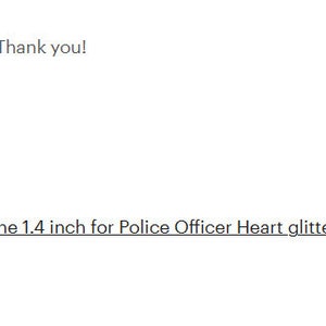 May include: A black heart-shaped iron-on patch with a thin blue line across the center. The patch is 1.4 inches in size and features glitter sparkle. The text "Thin Blue Line 1.4 inch for Police Officer Heart glitter sparkle iron on Patch! GL149" is visible below the patch.