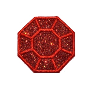May include: Red glitter diamond-shaped patch with a red embroidered outline.