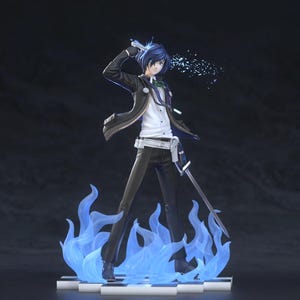 May include: A detailed figurine of a character with blue hair, wearing a black suit, white shirt, and black pants. The figure is holding a gun and a sword, with blue flames at the base. The background is dark.