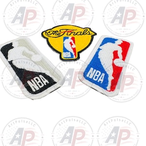 May include: Three embroidered patches featuring NBA branding. One patch is yellow with The Finals text and an NBA logo. Two rectangular patches show the NBA silhouette logo, one in black and white, and the other in red, white, and blue colors.