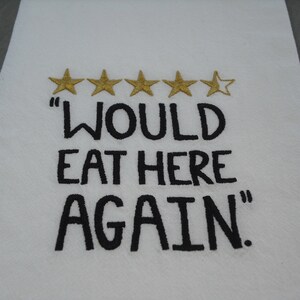 Flour sack towel.  &quot;Would eat here again.&quot; Machine embroidered.
