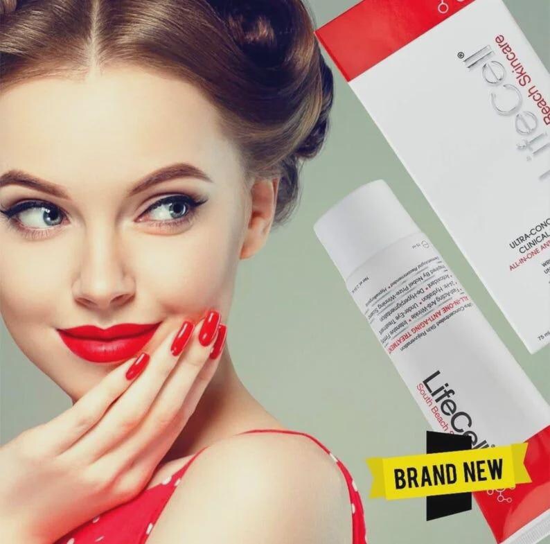 May include: A woman with red lipstick and nails holds a white tube of LifeCell anti-aging treatment. The product packaging is white and red, with the words "LifeCell" and "South Beach" visible. The words "BRAND NEW" are also displayed.