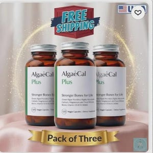 May include: Three brown glass bottles of AlgaeCal Plus supplements with silver lids and white labels. The labels read "Stronger Bones for Life." A gold ribbon below says "Pack of Three."