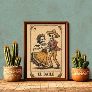 May include: A framed rectangular print featuring a vintage-style illustration of two skeletons dancing. The artwork displays the number 7 at the top and the text EL BAILE at the bottom. The skeletons wear traditional clothing, including a sombrero and a floral headpiece, rendered in muted tones of yellow, red, and brown.