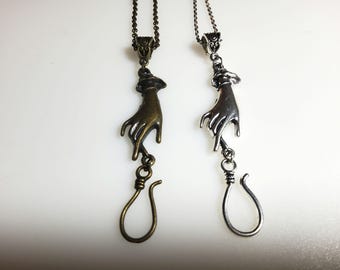 Helping Hand Portuguese Knitting Pin Necklace. Also available as a clip on.