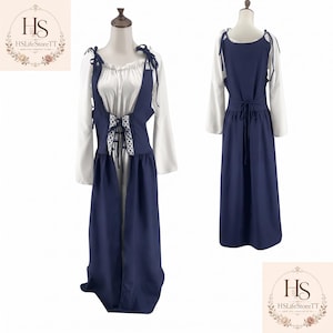 May include: A long-sleeved white blouse with a gathered neckline paired with a navy blue pinafore dress. The dress features shoulder ties, a lace-up front bodice with white patterned trim, and a full-length skirt. The back view shows a tie closure.