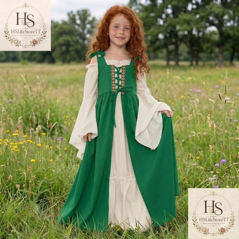 May include: A floor-length dress featuring a cream-coloured base with long, flared sleeves and an attached green over-layer. The green bodice includes a central lace-up detail with decorative trim, shoulder ties, and a full-length skirt design.