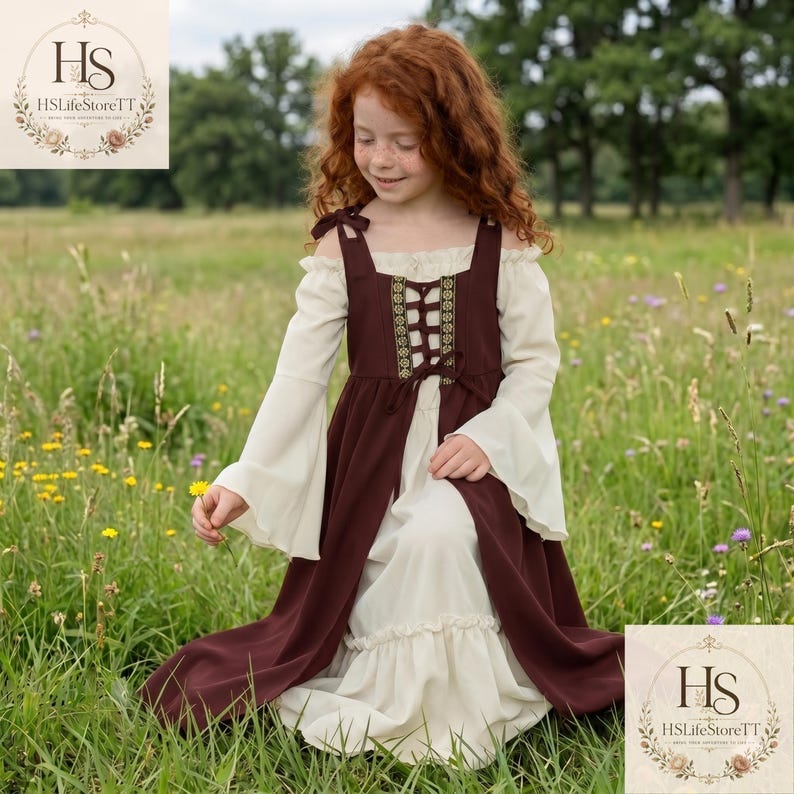 May include: A floor-length dress featuring a cream-coloured underlayer with long flared sleeves and an off-the-shoulder neckline, paired with a dark brown sleeveless overdress that has a lace-up bodice with decorative gold-toned trim.