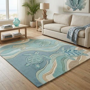 May include: A rectangular area rug featuring a pattern of sea turtles swimming through stylized ocean waves in shades of blue, teal, and beige. The design includes three distinct sea turtles with textured shells and fins, set against a background of flowing, layered curves that mimic the movement of water across the surface of the rug.