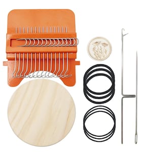 May include: An orange metal darning loom with silver hooks, a round light wood disc, a small circular wooden piece with a floral engraving, three black elastic bands, and two long silver metal needles for textile repair and weaving projects.