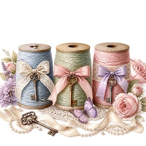 May include: Three cylindrical spools of twine in light blue, sage green, and soft pink, each wrapped with a lace or satin ribbon and a bronze-toned skeleton key. The arrangement includes decorative silk roses, lavender, a butterfly, and pearls.