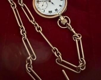 9 carat rose gold pocket watch with chain