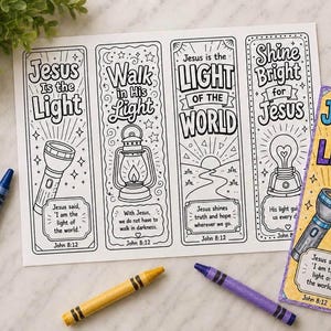 May include: A set of coloring bookmarks with the text "Jesus is the Light" and related phrases, along with crayons in various colors. The bookmarks feature illustrations of a flashlight, lantern, and lightbulb.