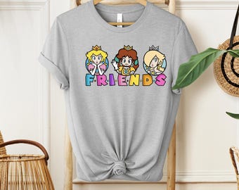 Princess Friends Orange T-Shirt - Peach Daisy Rosalina Graphic Tee - Cute Video Game Princess Shirt - Retro Gamer Girl Gift - Friends Theme