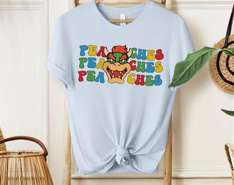 Camiseta Bowser Peaches, camiseta gráfica de la canción de la película de Super Mario, camiseta King Koopa color crema jaspeado, regalo divertido para fans de villanos de videojuegos