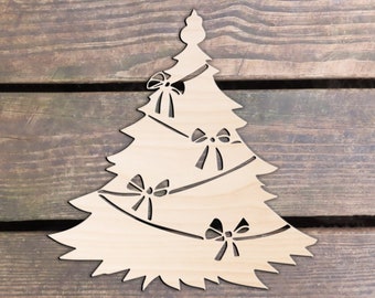 May include: A wooden Christmas tree cutout with a simple design and four bows. The tree is light brown and the bows are black.