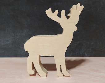 May include: A wooden reindeer cutout, painted in a light wood color. The reindeer has a simple design with large antlers and a long neck.