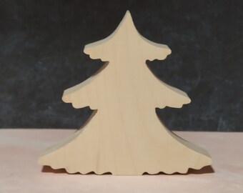 May include: A wooden Christmas tree ornament in a light brown color. The tree is simple and has a classic shape.