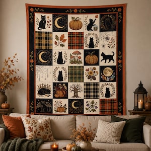May include: A rectangular wall tapestry featuring a grid of twenty-five squares with autumn and celestial themes. The design includes black cats, pumpkins, moons, plaid patterns, mushrooms, trees, and spiderwebs in orange, black, and cream colors.