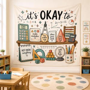 May include: A wall tapestry featuring a classroom shelf illustration with math tools, blocks, and an abacus. Text includes 'it's OKAY to', 'make mistakes', 'try another way', 'show your work', 'have hard days', 'NOT KNOW everything', and 'ask for help'.
