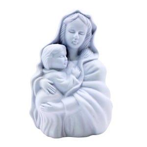 May include: A light blue statue of a woman holding a child. The woman wears a draped head covering and holds the child close. The statue has a smooth, matte finish and is set against a white background. The sculpture is a religious item.