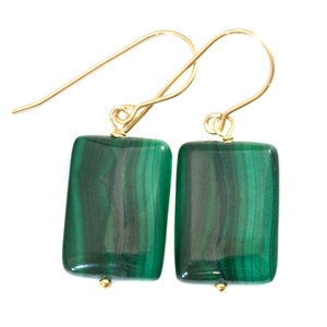 May include: A pair of gold earrings with rectangular green malachite stones.