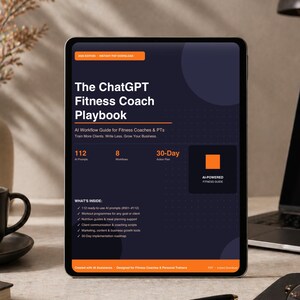 May include: A digital tablet displays "The ChatGPT Fitness Coach Playbook." The cover is dark blue with white text and orange accents. The screen shows information about AI prompts, workflows, and a 30-day action plan for fitness coaches and personal trainers.