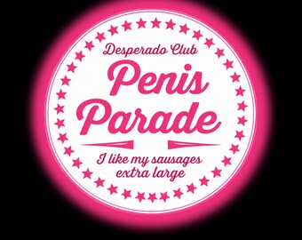May include: A circular sticker with a white center and a bright pink glowing border. The text reads Desperado Club, Penis Parade, and I like my sausages extra large in pink script and sans-serif fonts, surrounded by a ring of small pink stars.