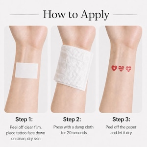 May include: A three-step guide on how to apply a temporary tattoo. The steps include peeling off the clear film, pressing with a damp cloth for 20 seconds, and peeling off the paper. The final step shows three red heart tattoos.