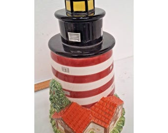 Tarro para galletas con forma de faro, de rayas rojas y blancas, estilo vintage, con tapa.