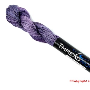ThreadworX 1129 Variegated Embroidery Floss Merlot thread has a repeating gradient of dusky medium and dark purples and is used for cross stitch, embroidery, needlepoint, making friendship bracelets, and other crafts.
